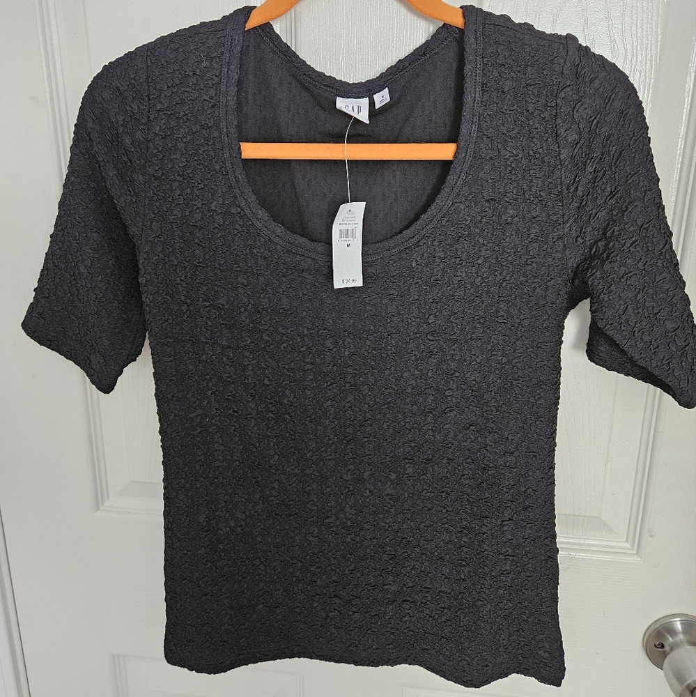 Black half sleeve popcorn blouse